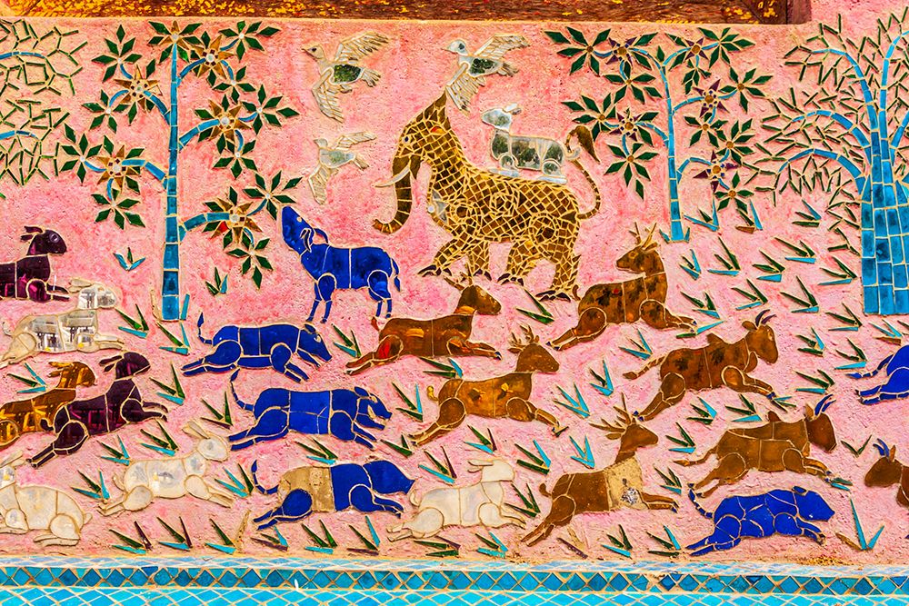 Laos- Luang Prabang. Mosaic mural depicting animals.